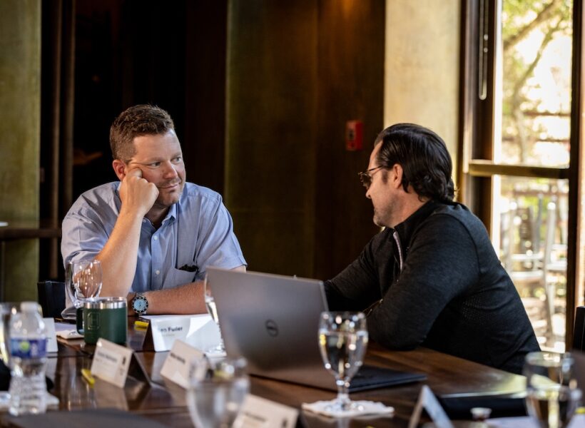 C12 CEO peer advisory group members meeting at monthly forum.